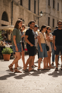 generate a vertical image, people wearing sandals